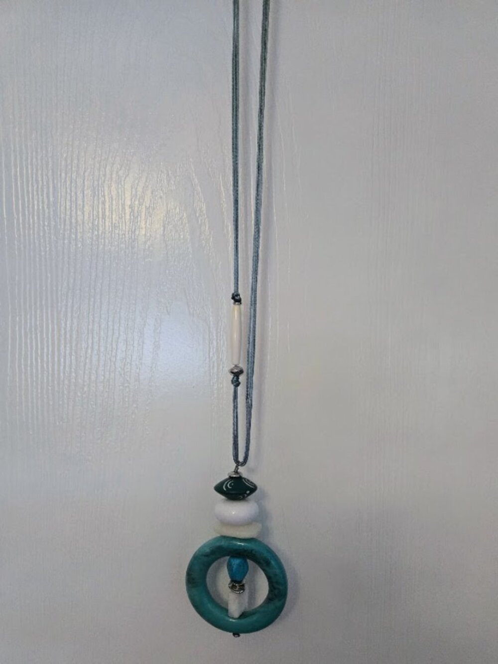 Chico's long statement necklace with chunky turquoise and white elements